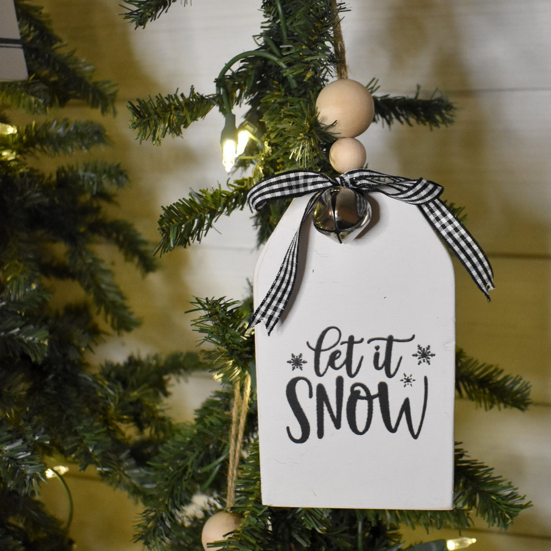 rustic christmas tree ornament with silver bell | white