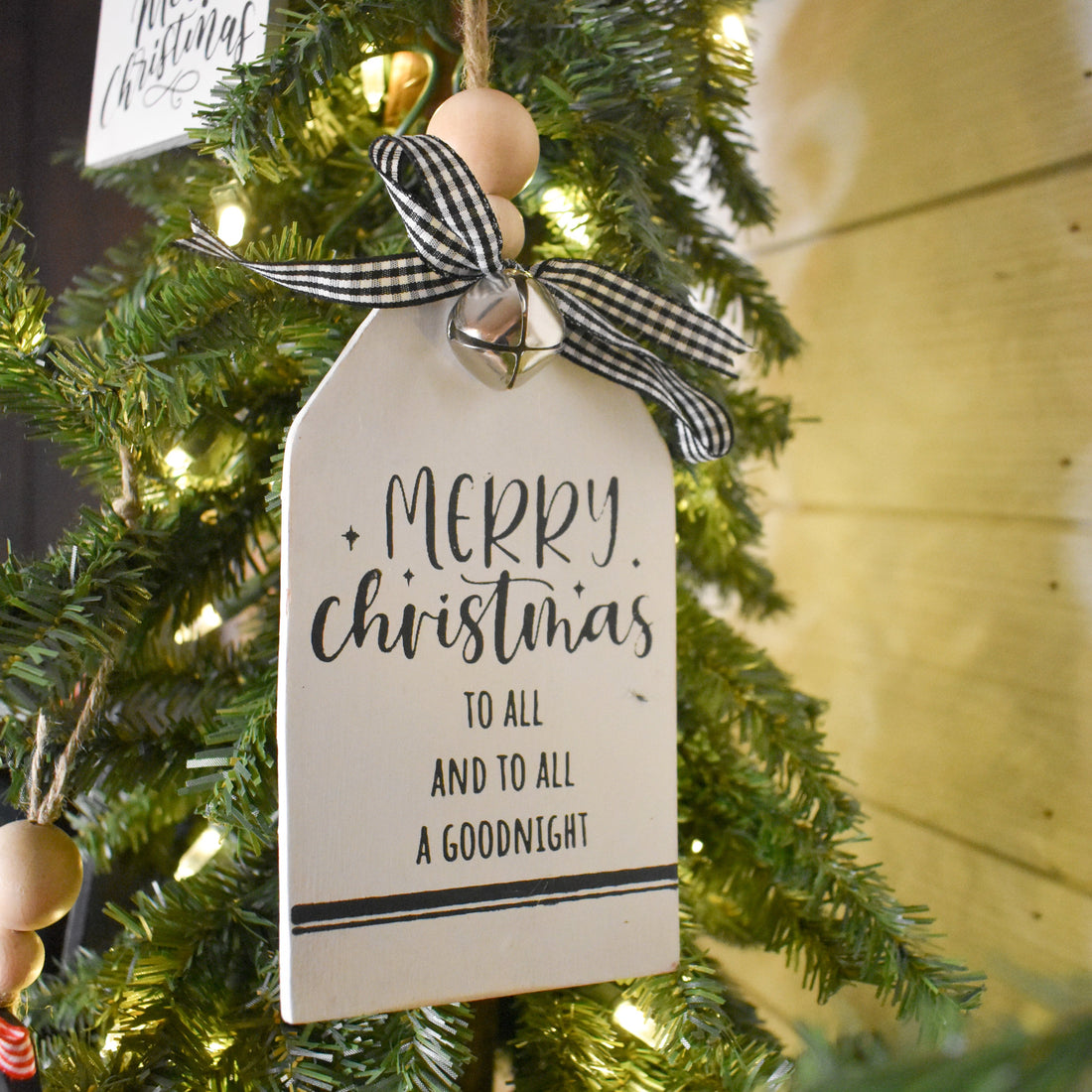 rustic christmas tree ornament with silver bell | white