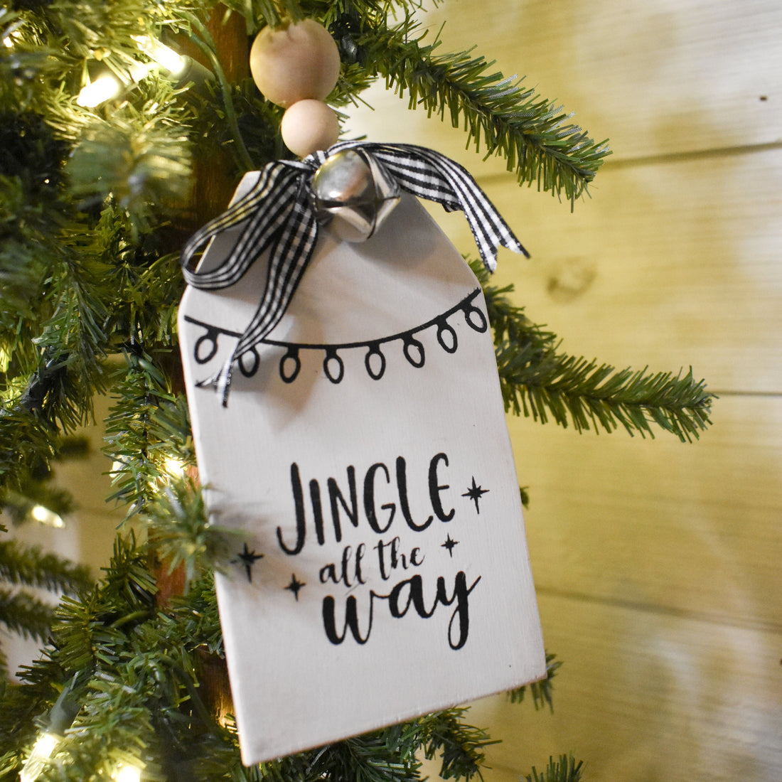 rustic christmas tree ornament with silver bell | white