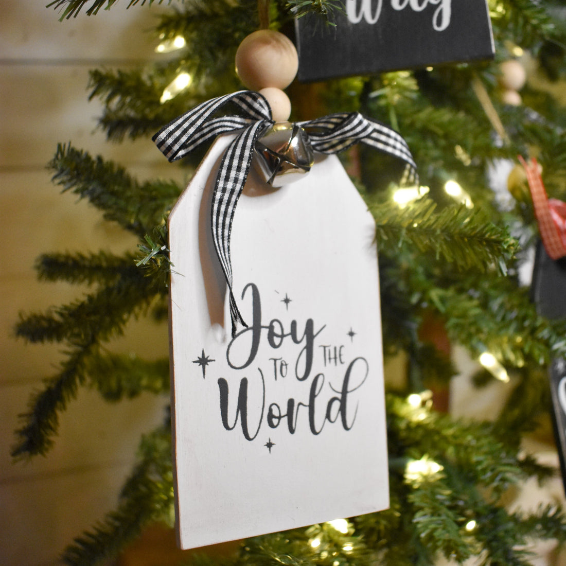 rustic christmas tree ornament with silver bell | white