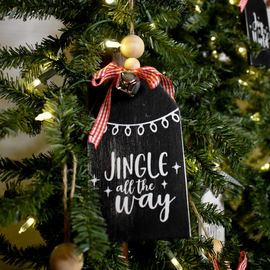 rustic christmas tree ornament with silver bell | black