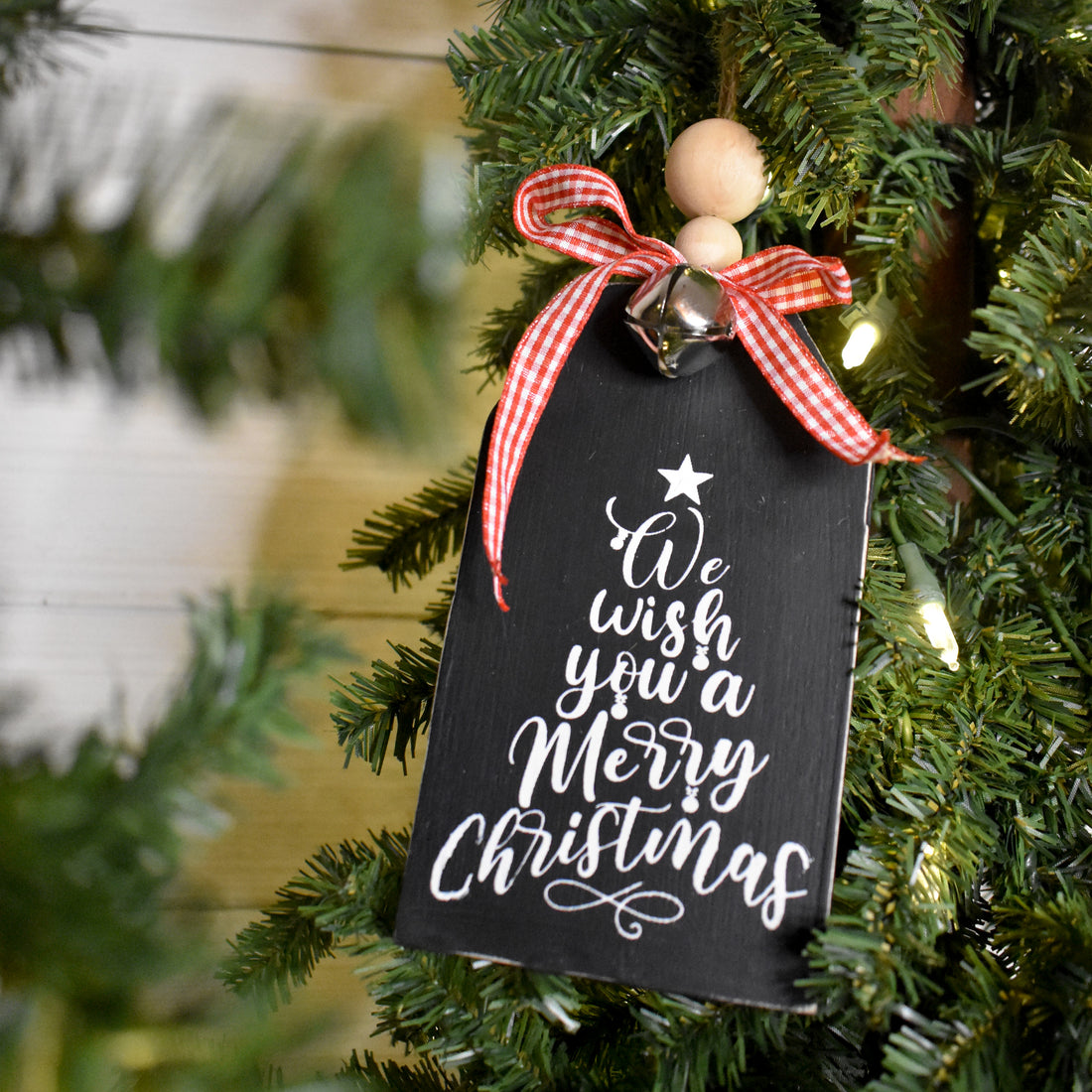 rustic christmas tree ornament with silver bell | black