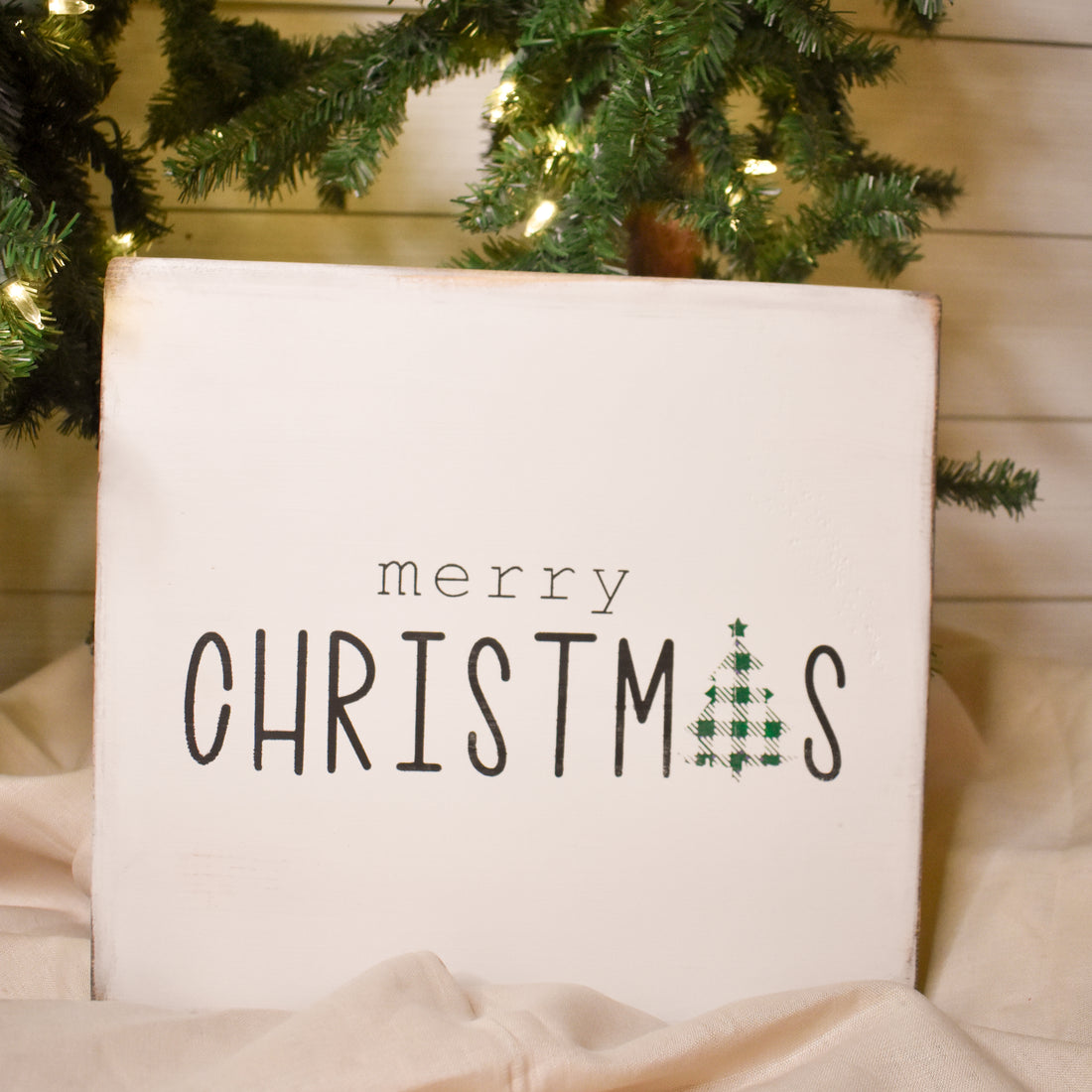 merry christmas with green checkered tree