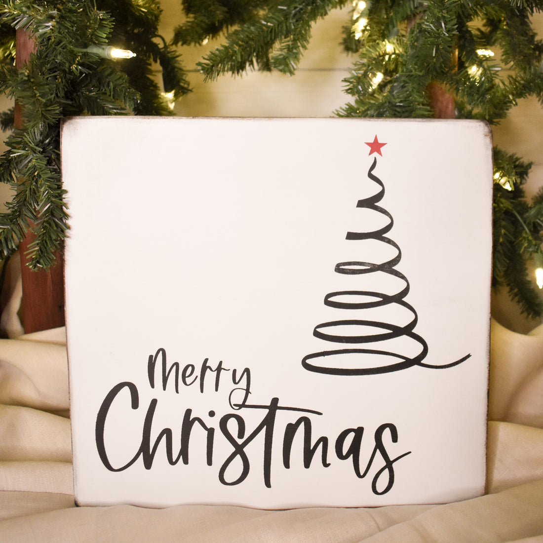 merry christmas with spiral tree and red star