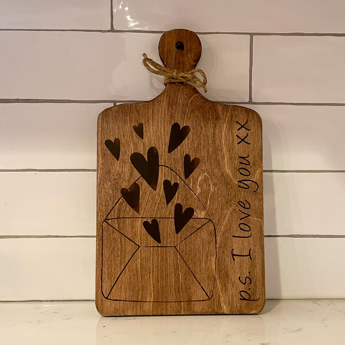 cutting board: wood-burned | p.s. i love you with envelope and hearts