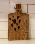 cutting board: wood-burned | p.s. i love you with envelope and hearts