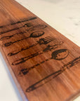 cutting board: wood-burned | cutlery