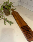 cutting board: wood-burned | cutlery