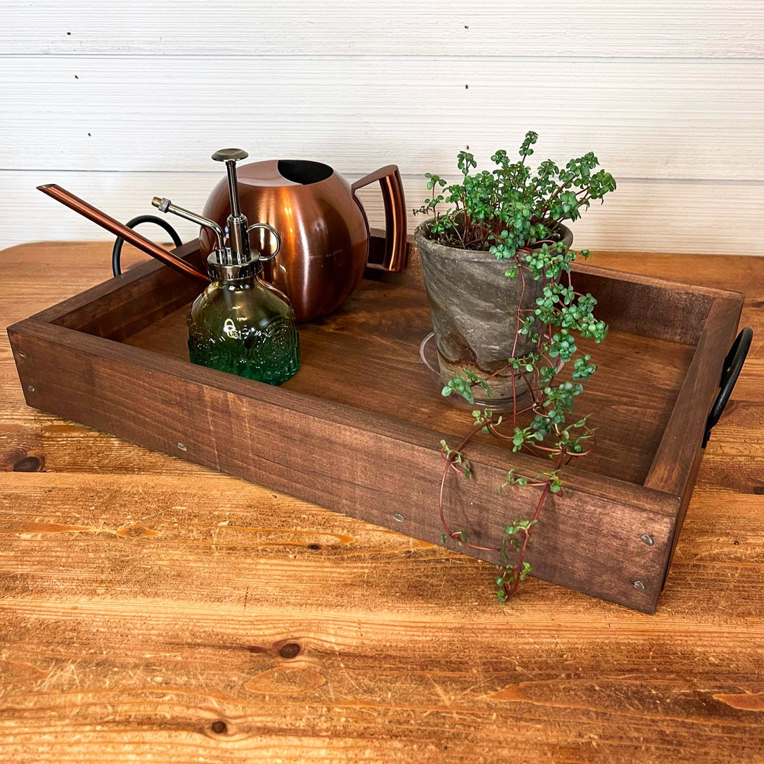 rustic serving tray with white flowered design