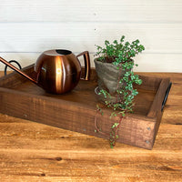 rustic serving tray with white flowered design