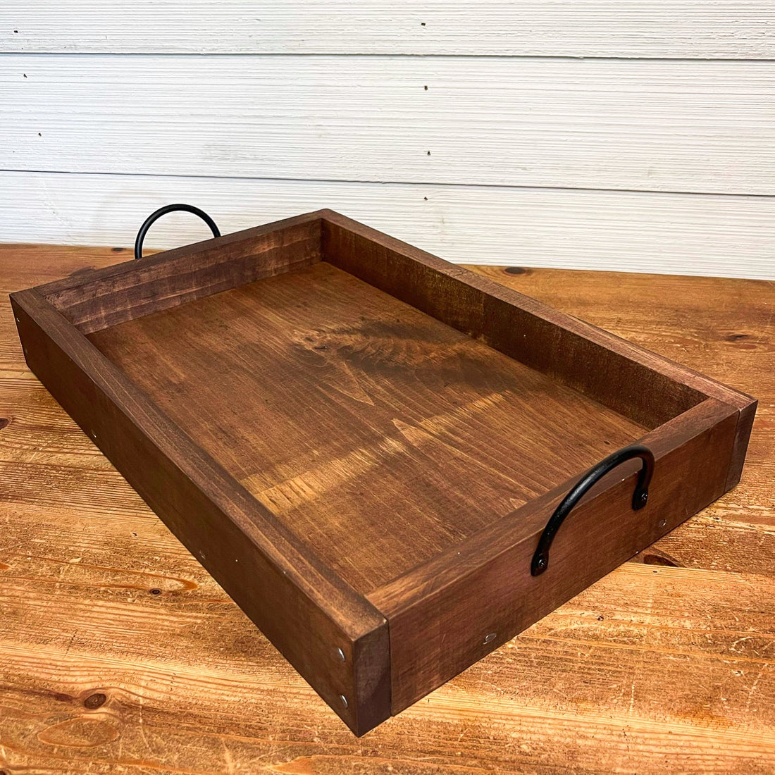 rustic serving tray with white flowered design