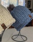 chunky knitted beanie hat with pom-pom