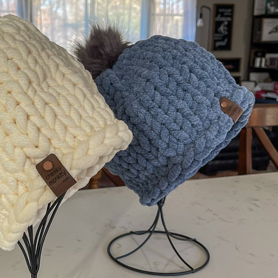 chunky knitted beanie hat with pom-pom
