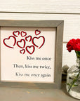 kiss me once, then kiss me twice kiss me once again
