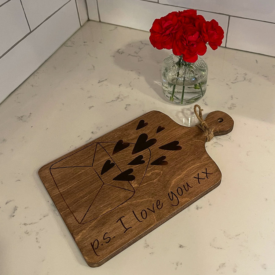 cutting board: wood-burned | p.s. i love you with envelope and hearts