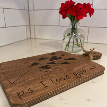 cutting board: wood-burned | p.s. i love you with envelope and hearts