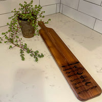 cutting board: wood-burned | cutlery