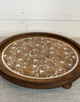 rustic wood riser with white flowered design