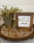rustic wood riser with white flowered design