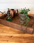 rustic serving tray with white flowered design